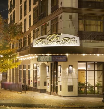 Exterior view of hotel entrance & illuminated sign at Paramount Hotel Seattle