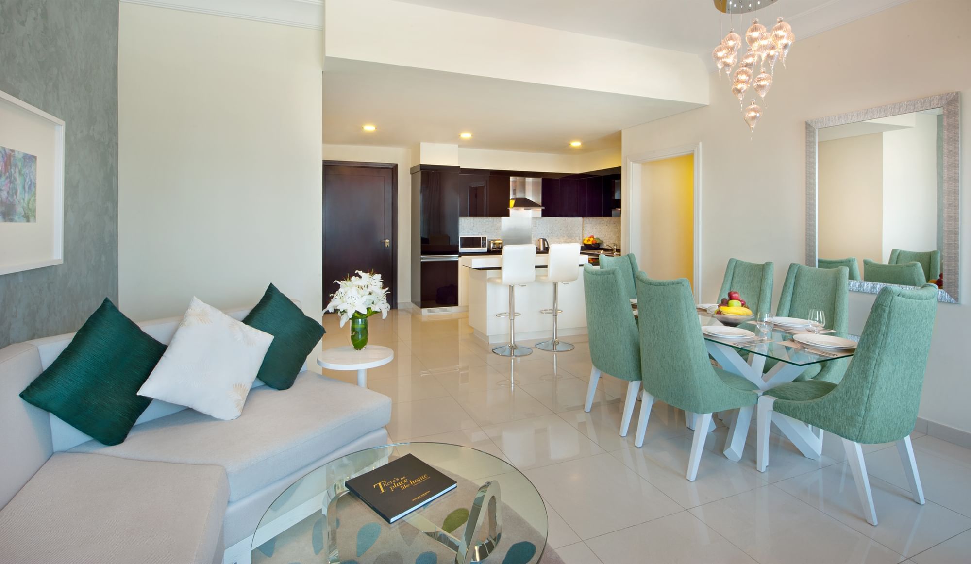 Kitchenette and living area in Three Bedroom Suite at DAMAC Maison Mall Street