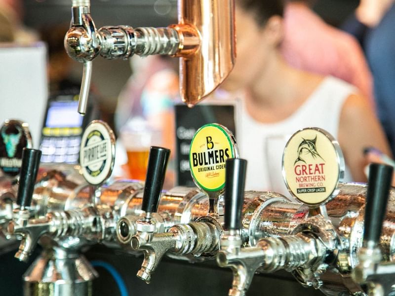 Close-up of Juice Can taps in The Pub at Crown Hotel Melbourne
