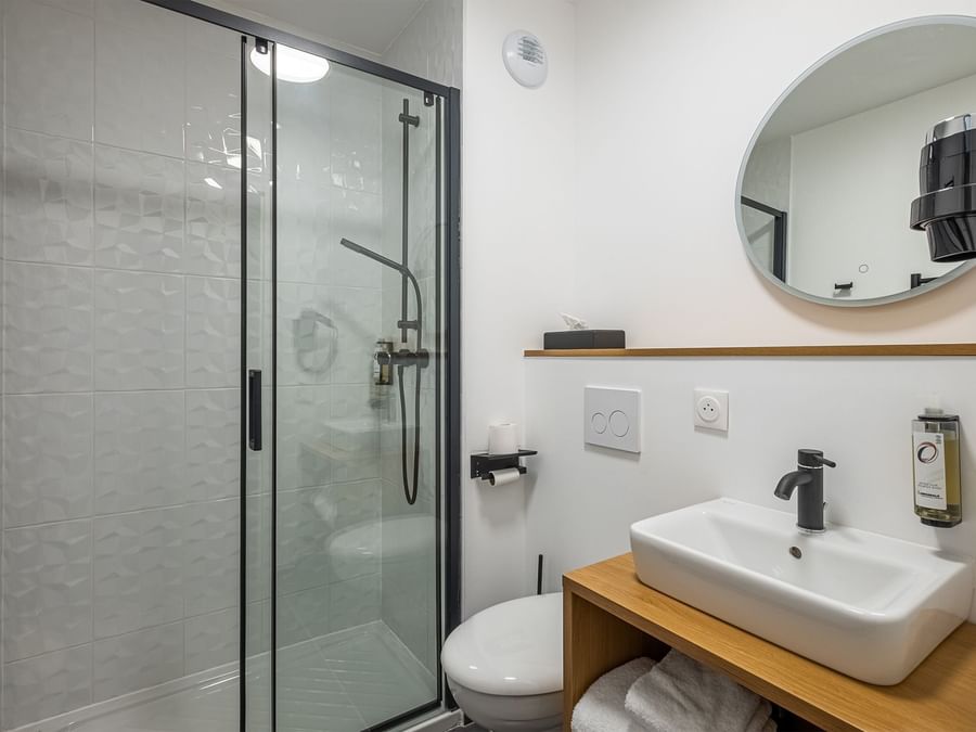 Bathroom with shower in Double room at The Originals Hotels