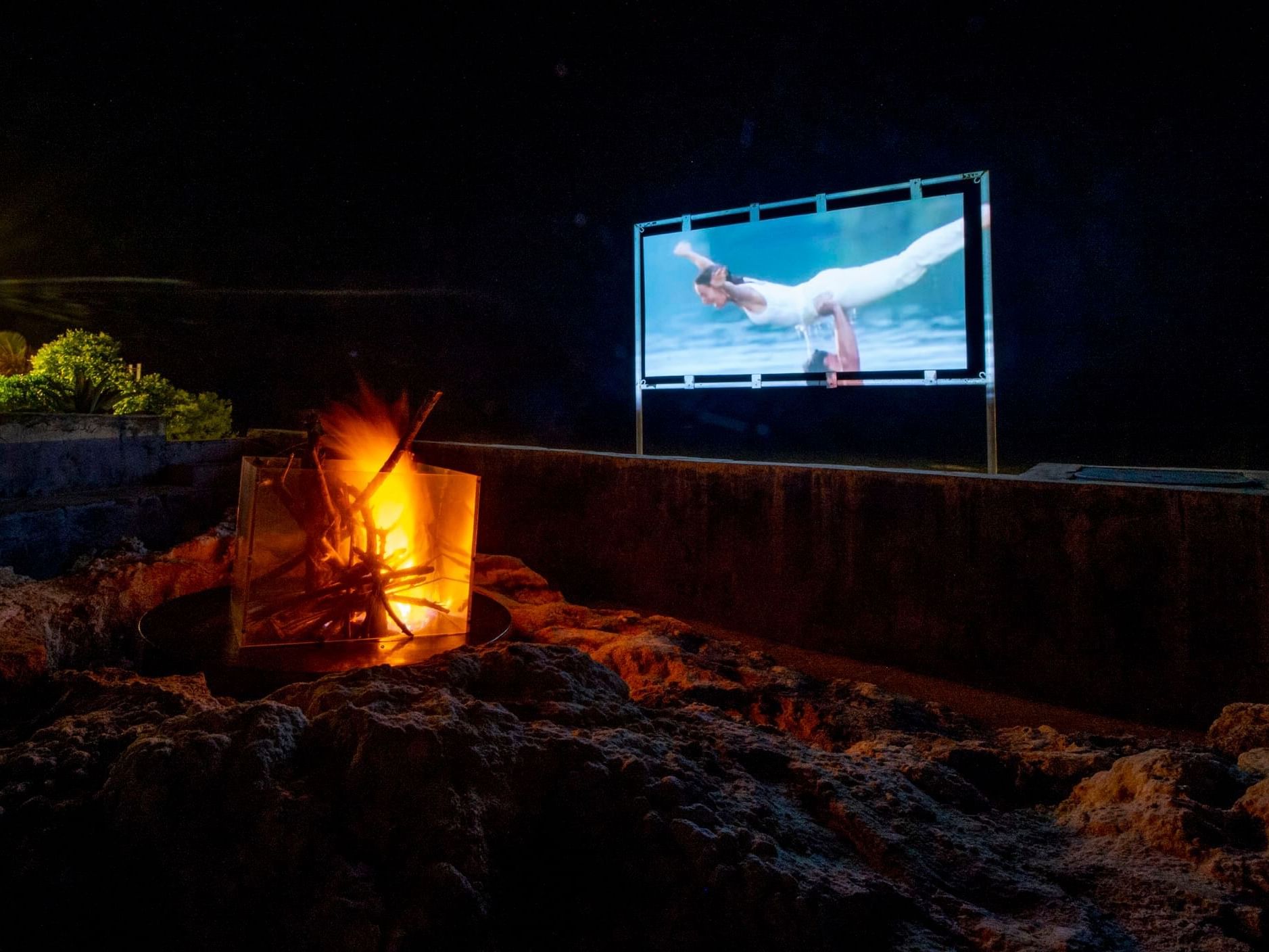 Movie at night with fire near SafiraBlu Luxury Resort & Villas