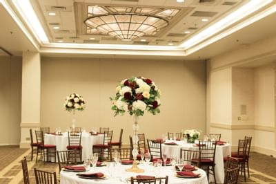 ballroom with tables and rose decorations