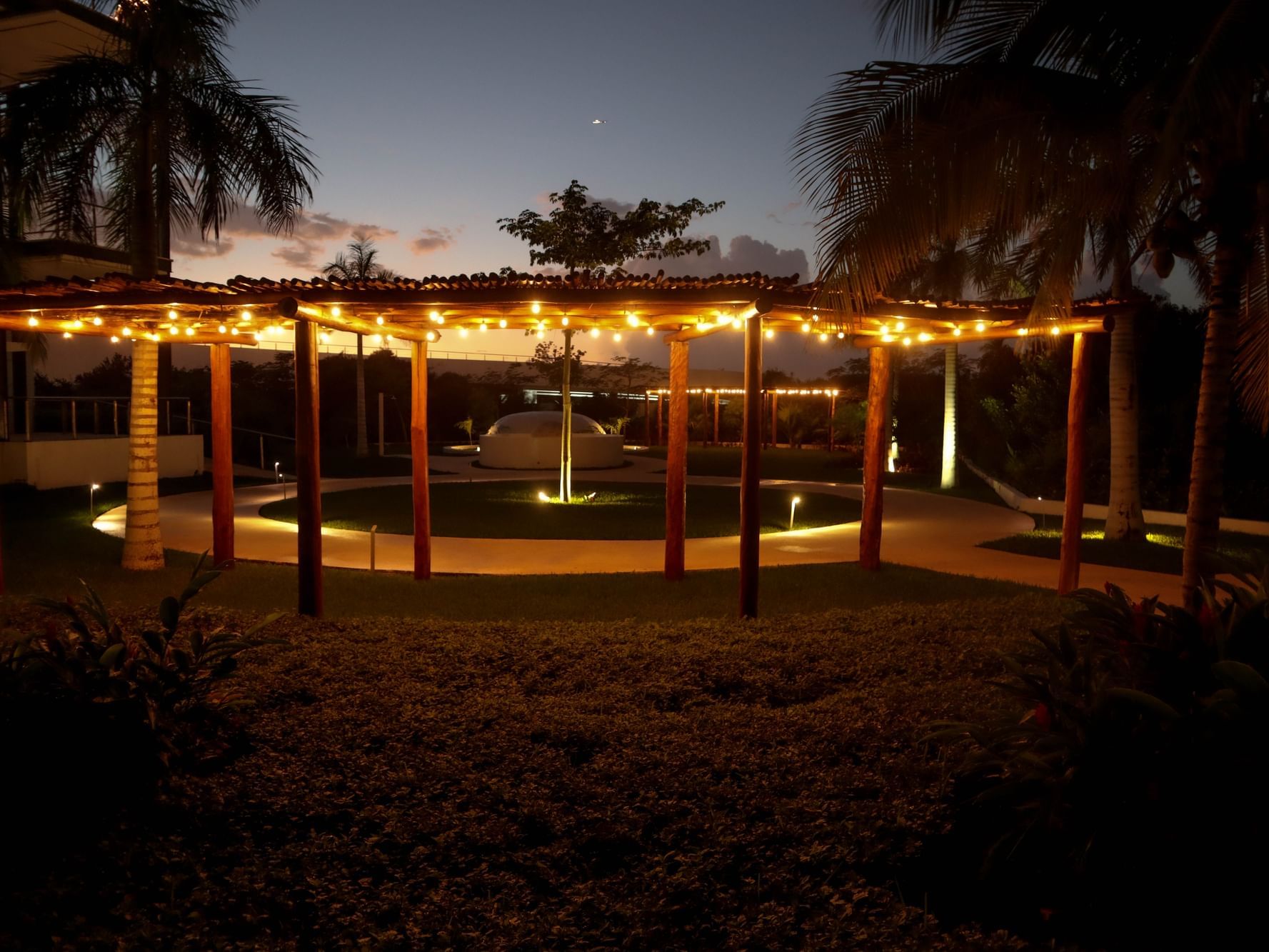 Exterior view of the gazebo at night at Haven Riviera Cancun