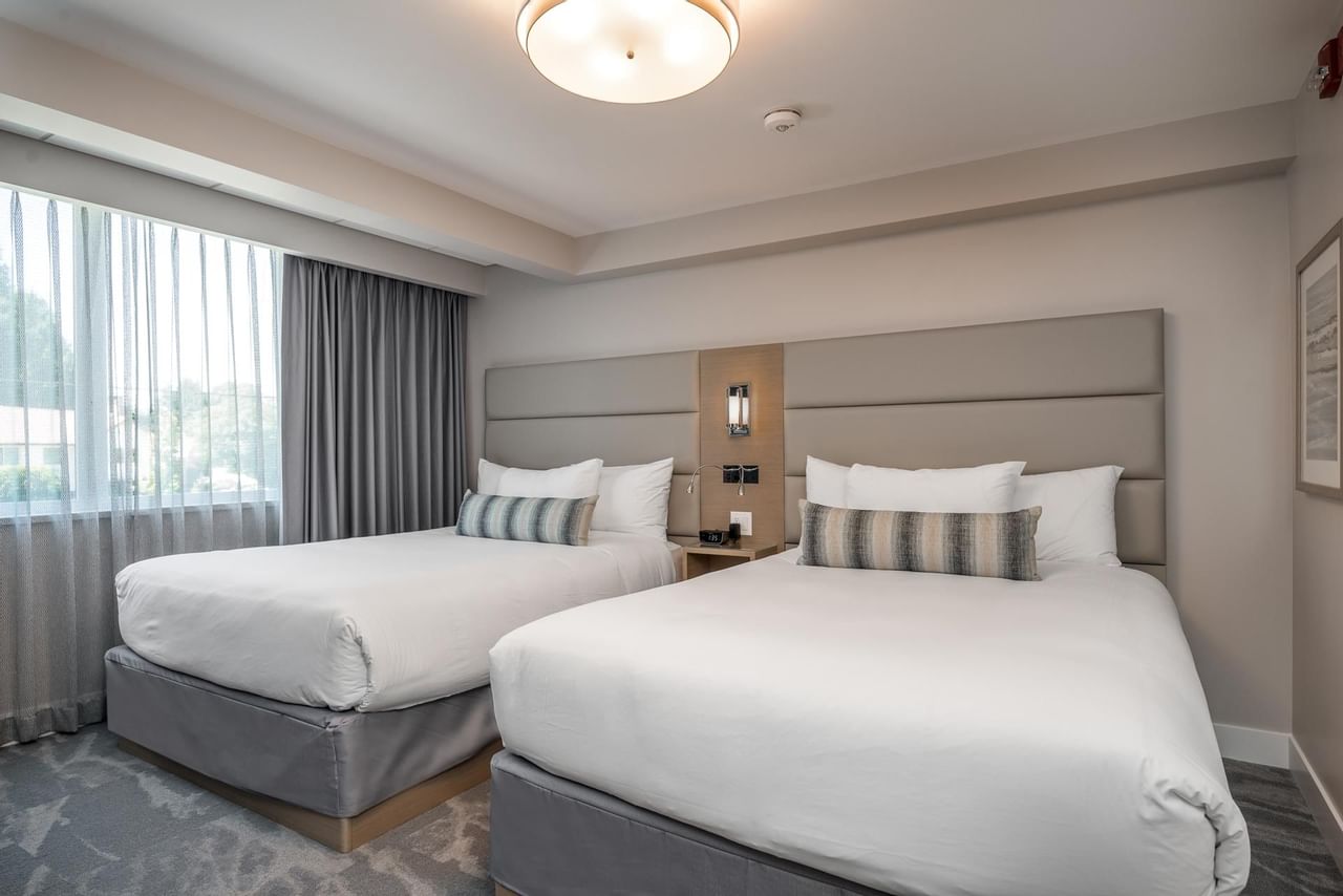 Bedroom in Coast Two Queens Suite