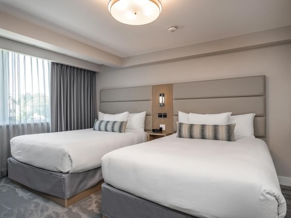 Two queen beds in bedroom