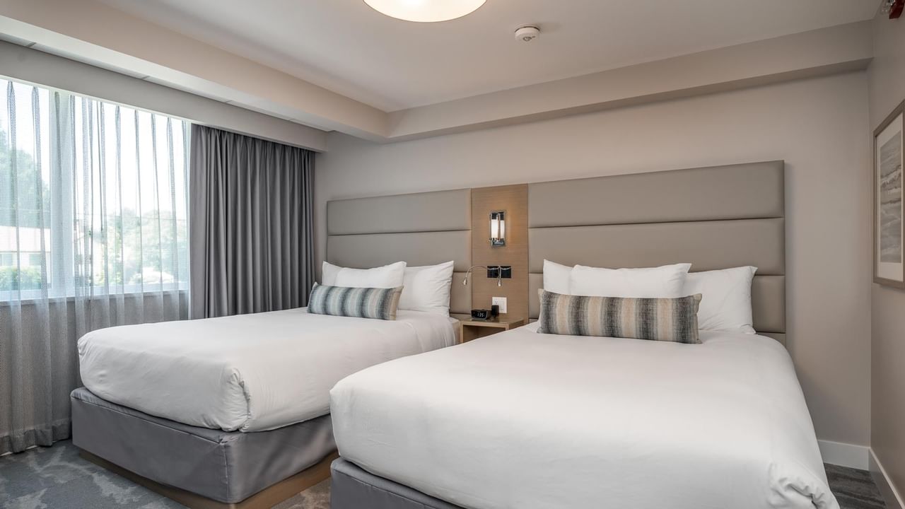 Two queen beds in bedroom