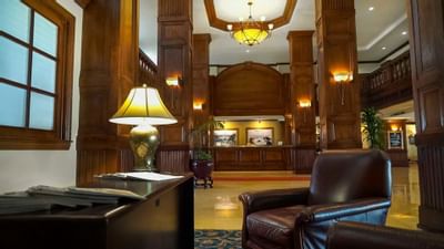 lobby with leather chairs and reception desk