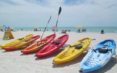 Kayaks on the beach near Bilmar Beach Resort