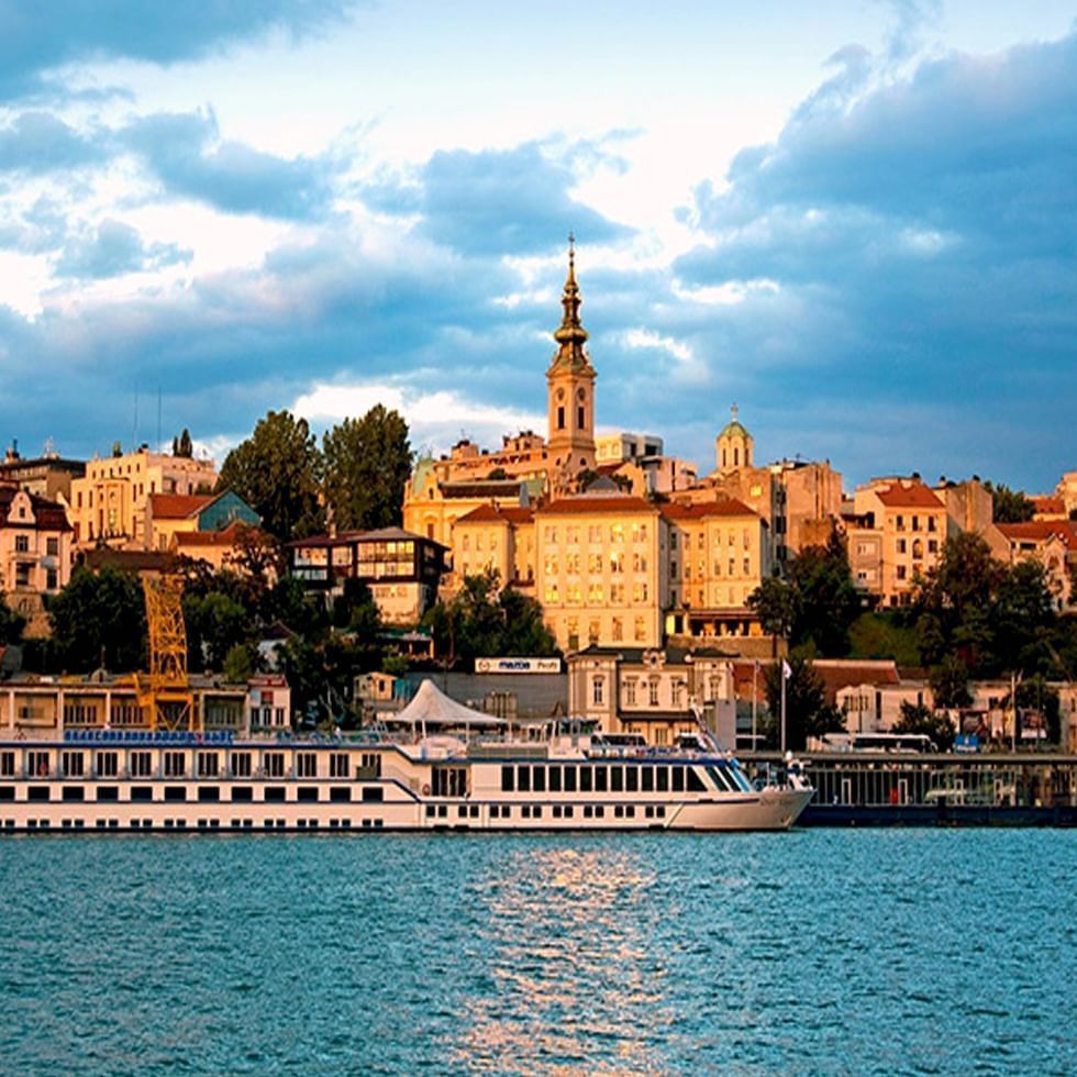 Riverfront view of Belgrade with moored cruise ship near Falkensteiner Hotel Belgrade