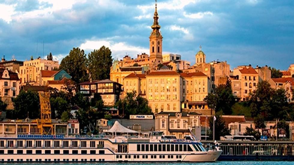 Riverfront view of Belgrade with moored cruise ship near Falkensteiner Hotel Belgrade