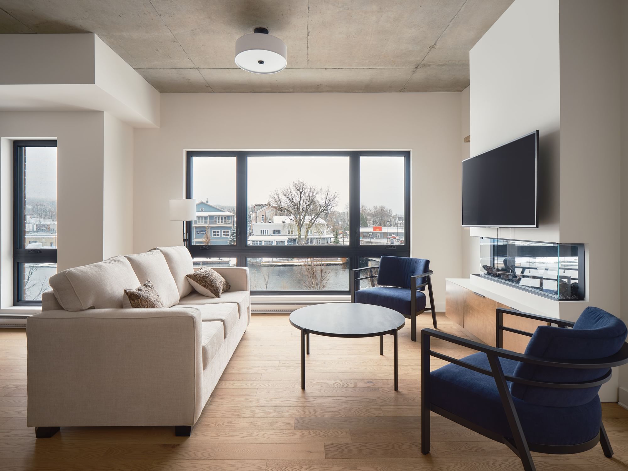 Living area in 206 One Bedroom Suite at Quartier Des Marinas