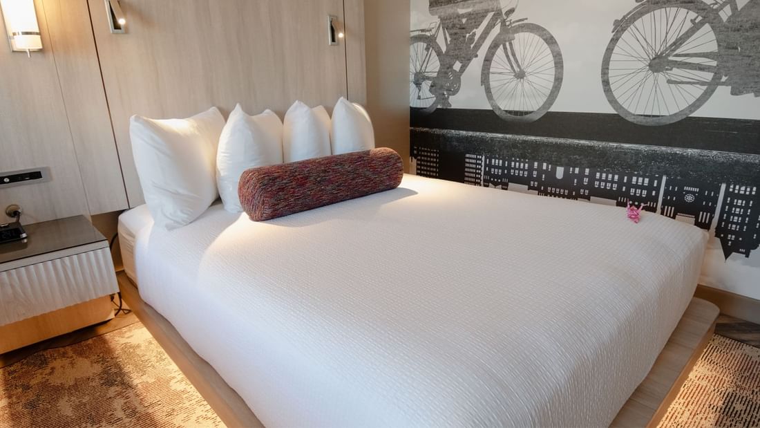 queen bed in a hotel room