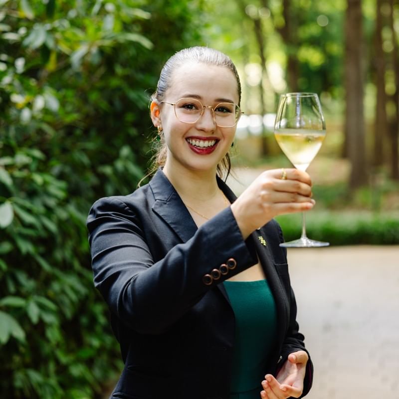 Hannah S with a glass of bubbles