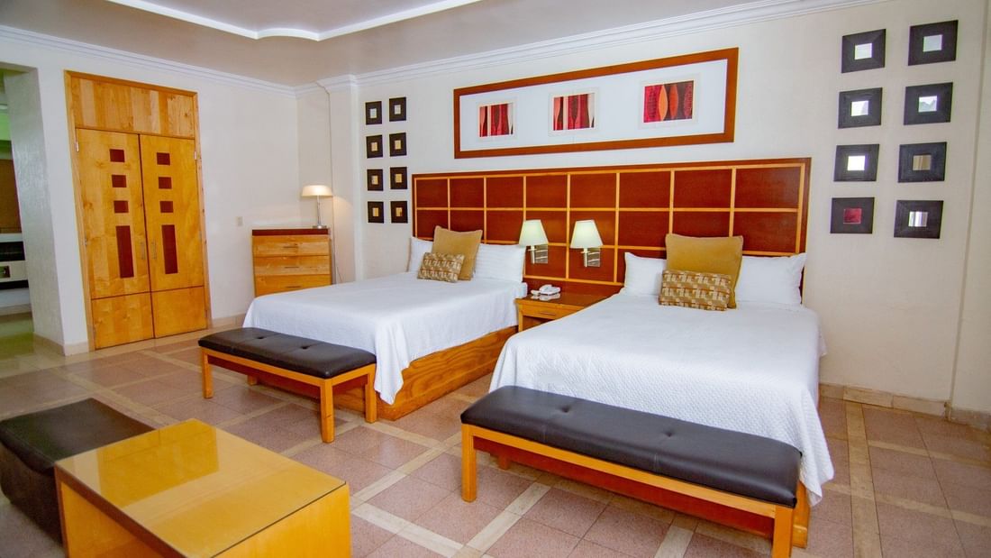 Interior of Master Suite with 2 beds at Gamma Hotels