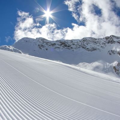 Landscape view of a snowy mountain near Falkensteiner Hotels