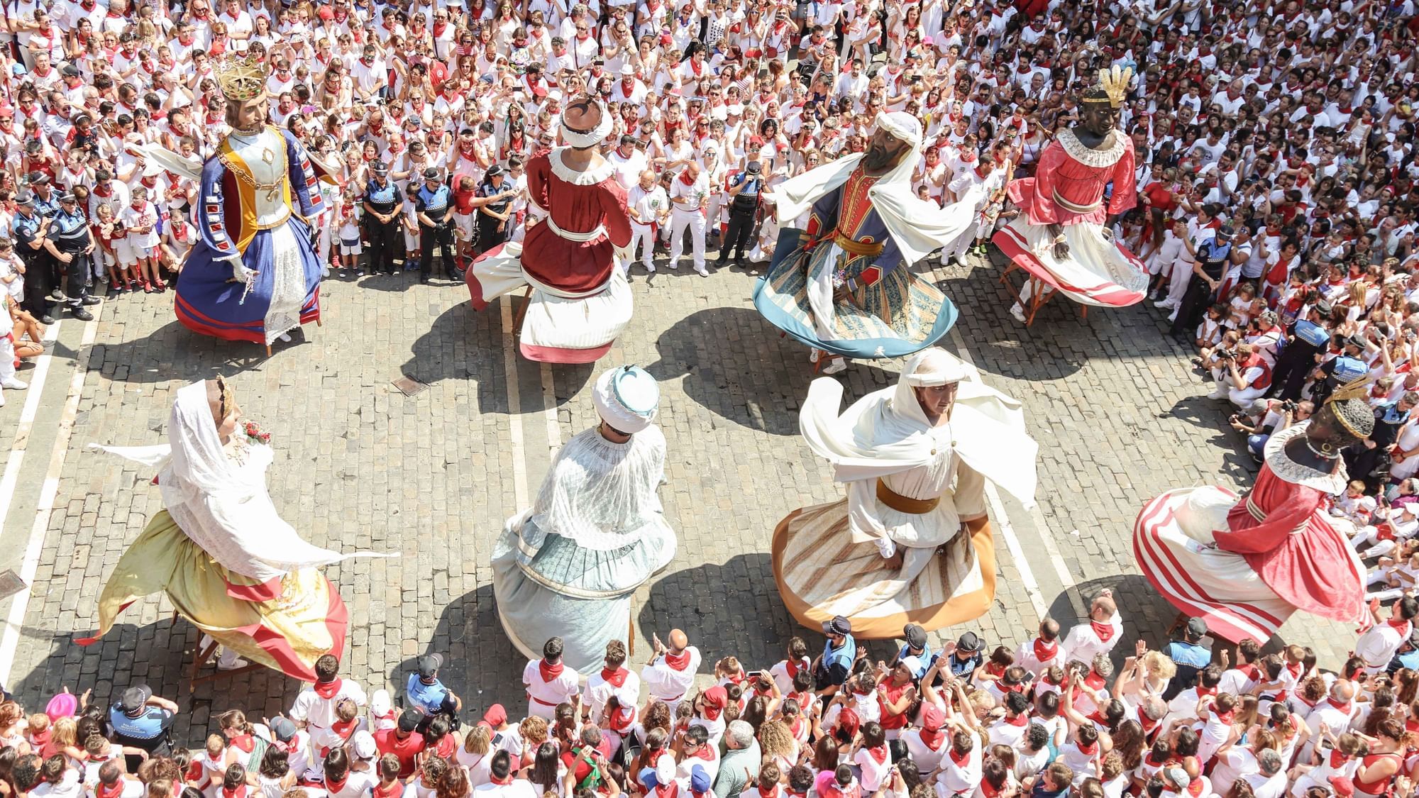 Top shot of a traditional parade in Spain near Originals Hotels