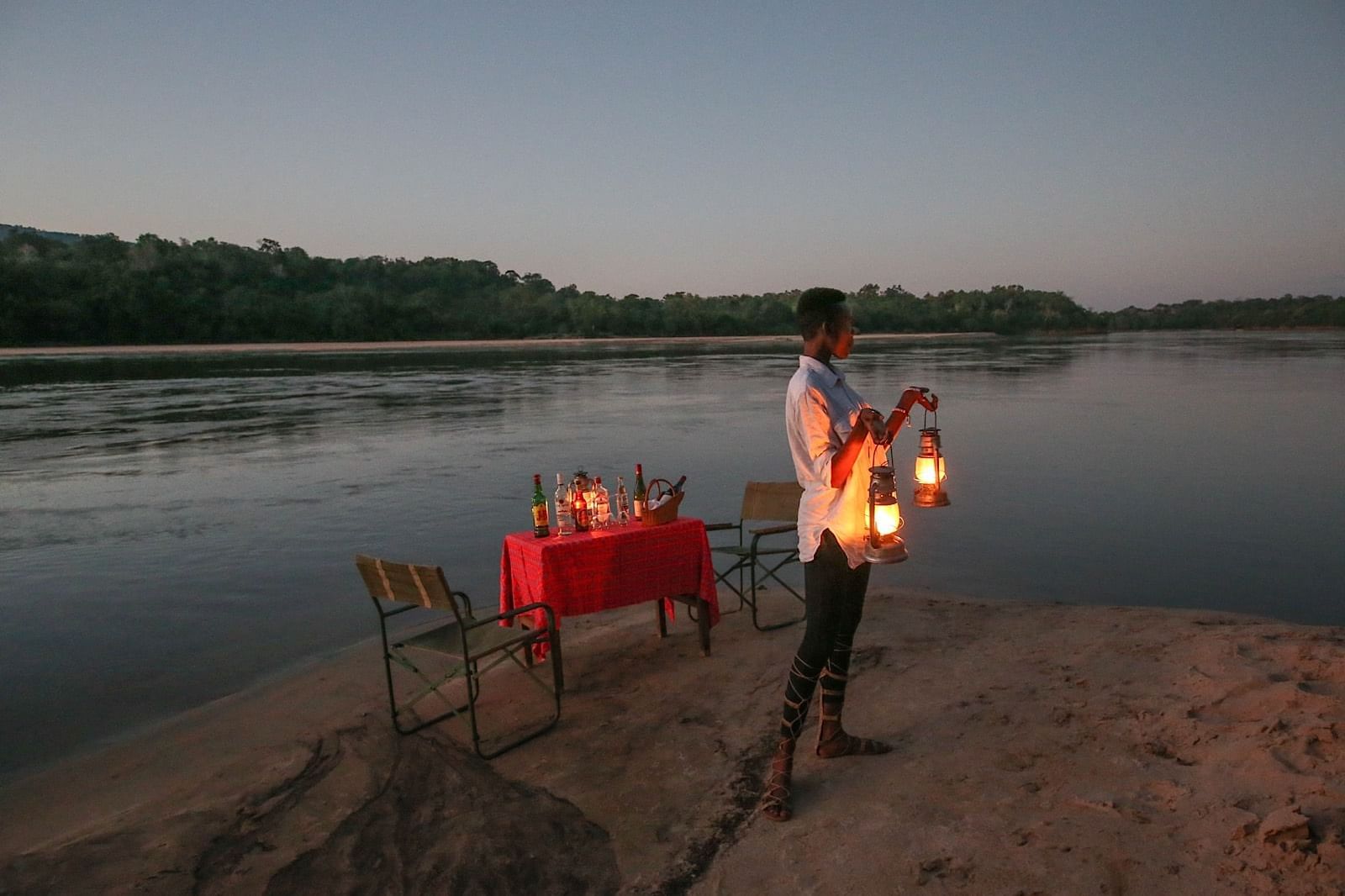 A Bush Dinner by the river at Serena Mivumo River Lodge