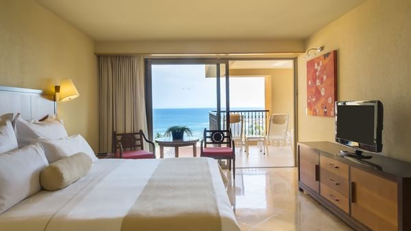 King bed & TV in Family Suite at Grand Fiesta Americana