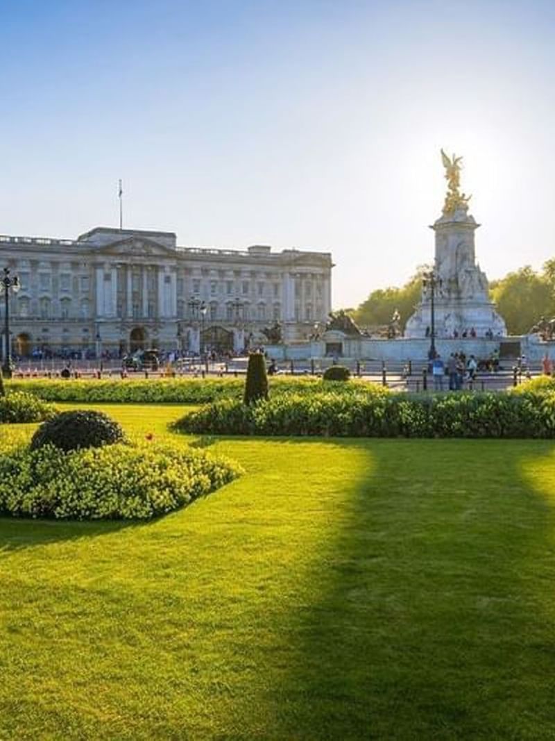 Golden statue of Victory standing by Buckingham Palace near The Capital Hotel, Apartments and Townhouse