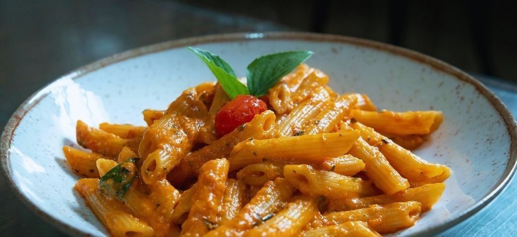 Penne pasta in creamy tomato sauce