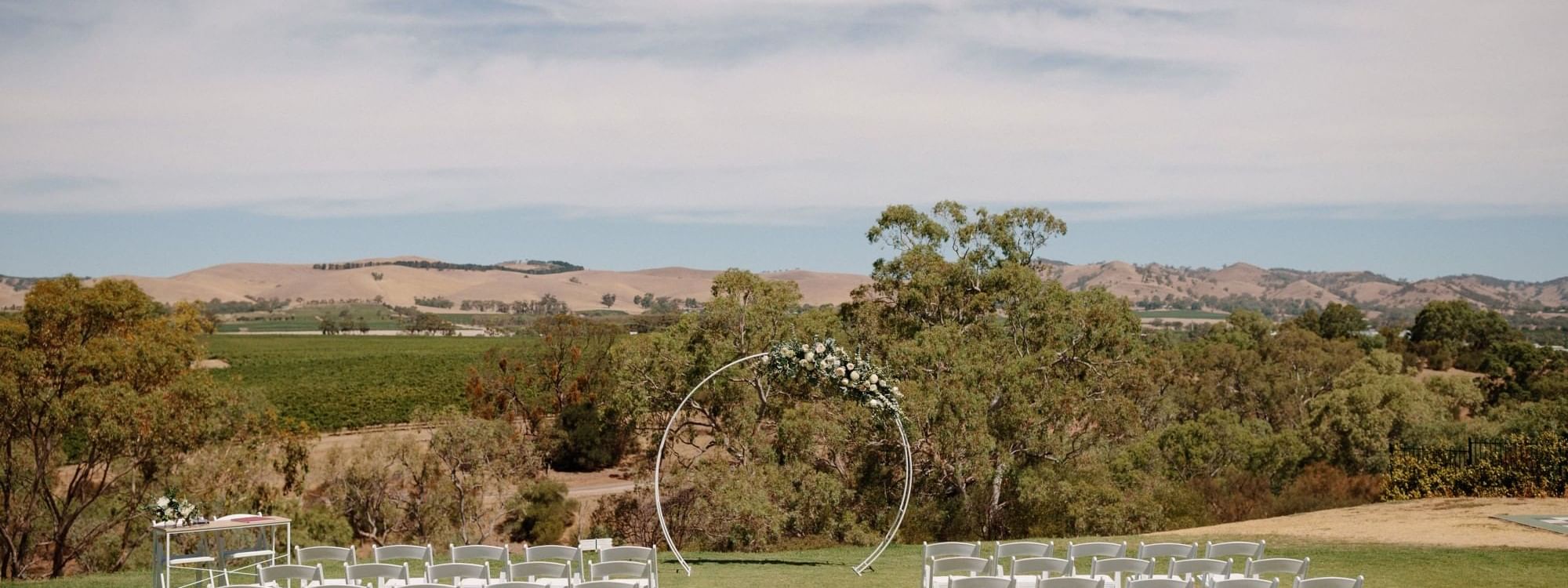 Table setting in an outside wedding ceremony at Novotel Barossa