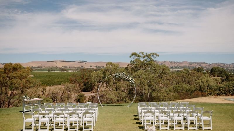 Table setting in an outside wedding ceremony at Novotel Barossa