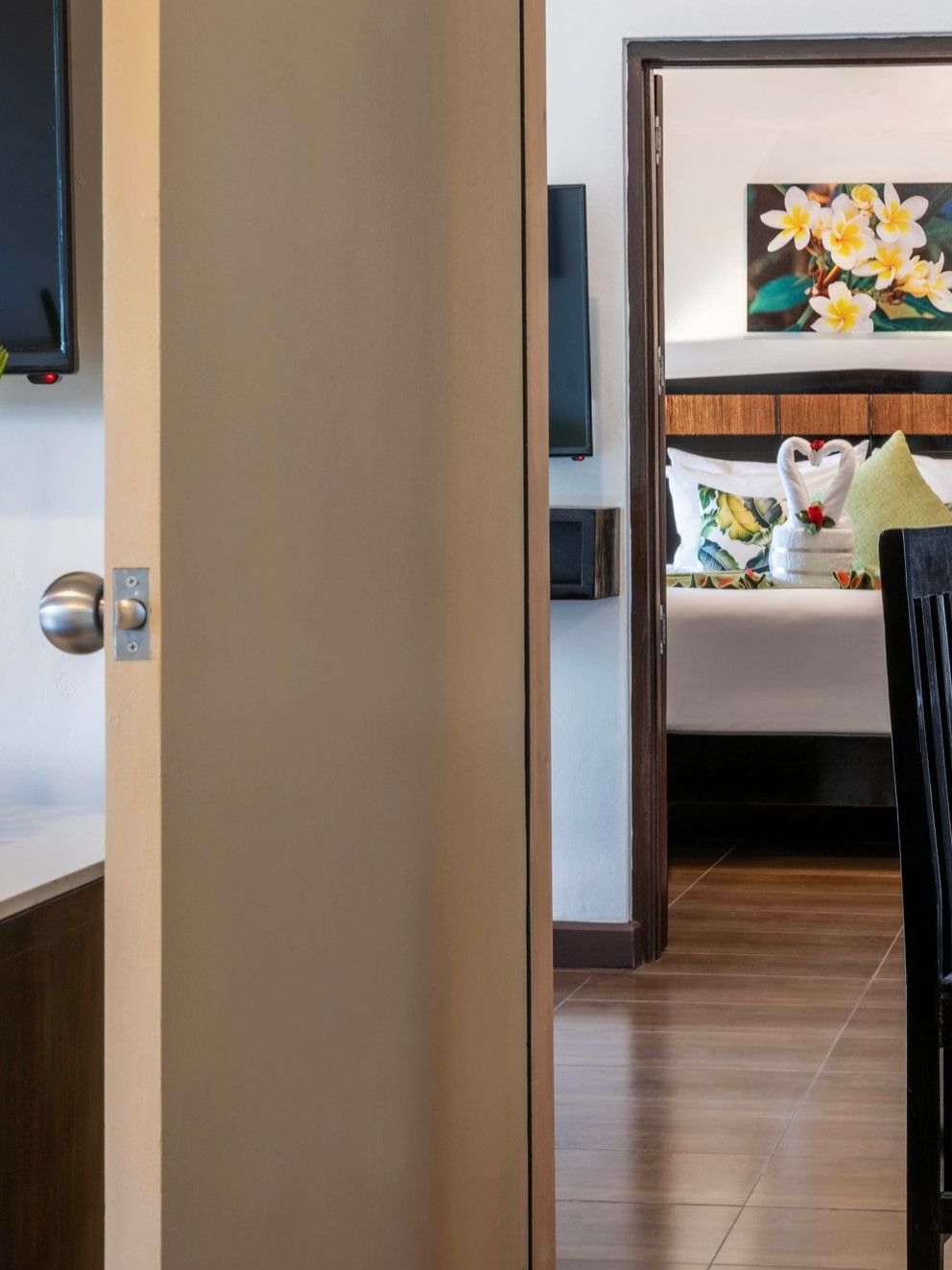 One Bedroom Villa interior with dining area and bed visible at Tokatoka Resort - Fiji International Airport, Nadi.