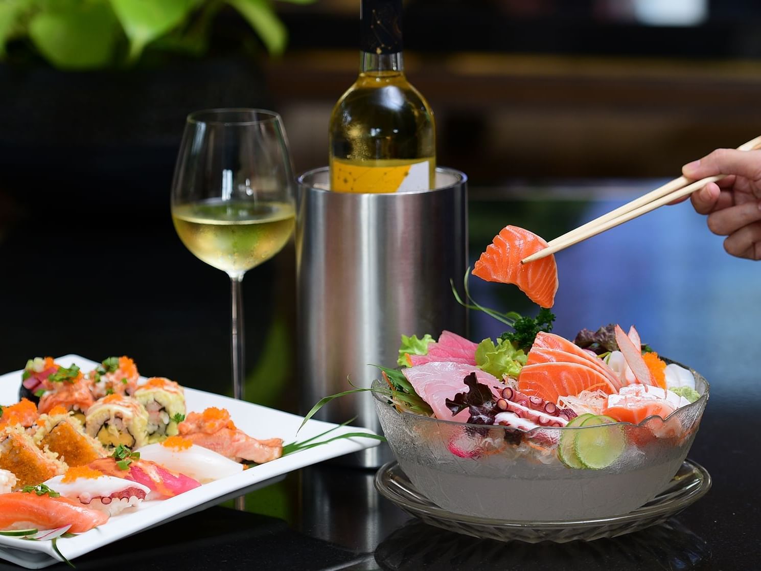 Sushi platter & wine served at Chatrium Hotels & Residences