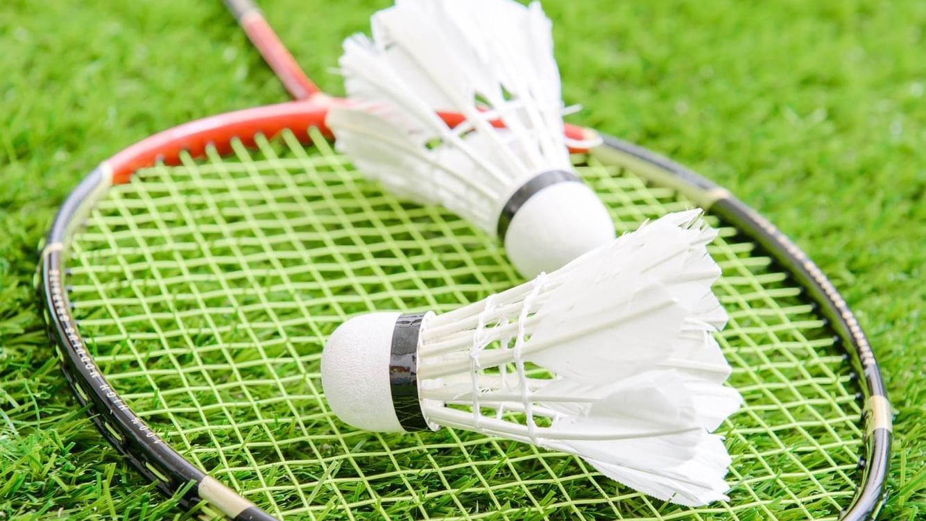 Close-up of shuttle cocks laying on a badminton racket at Cove Pocono Resorts