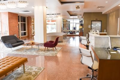 tables and chairs in a lobby area