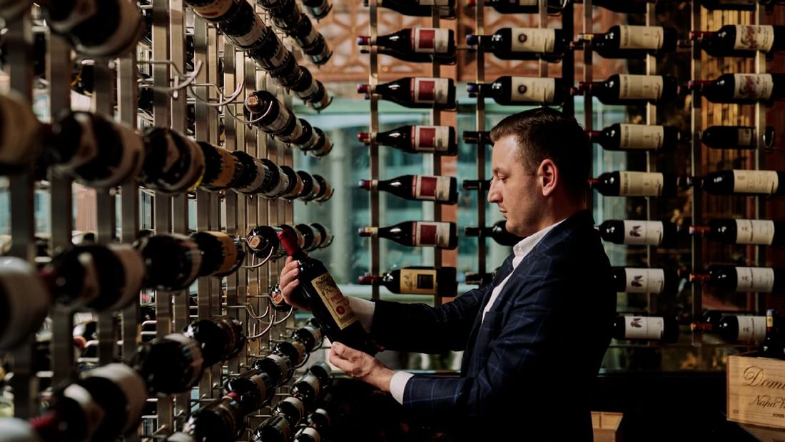 Man with a bottle in Gordon Ramsay Bar & Grill at Sunway Resort