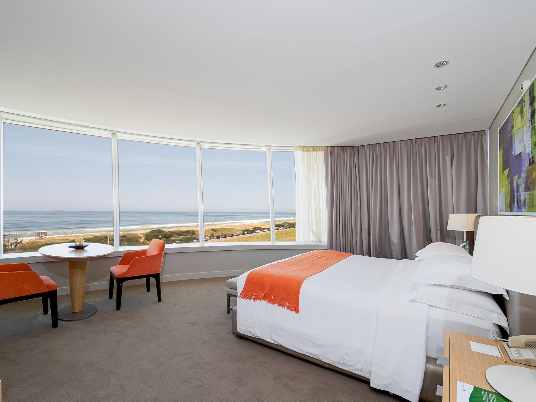 King bed & lounge in Ocean Front Junior at Grand Hotels Lux