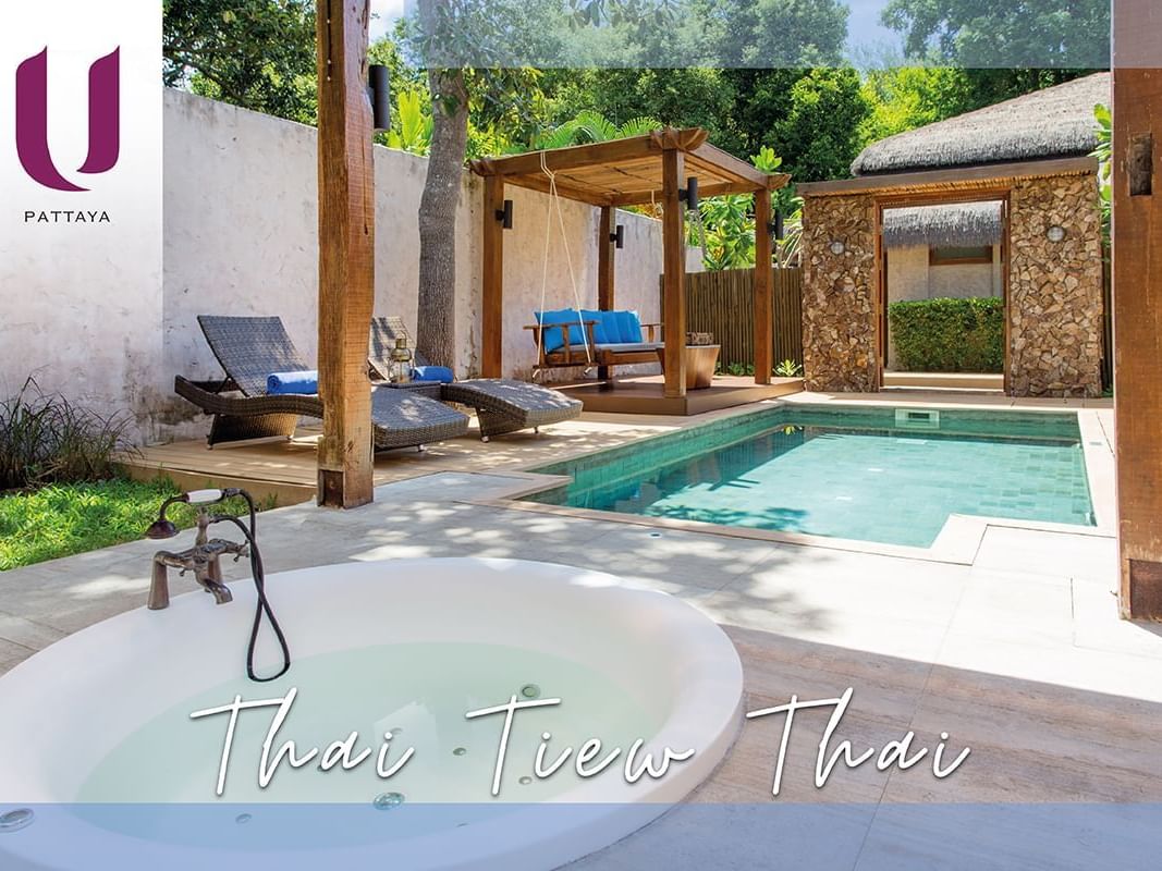 Swimming pool with sun beds and jacuzzi at U Hotels and Resorts