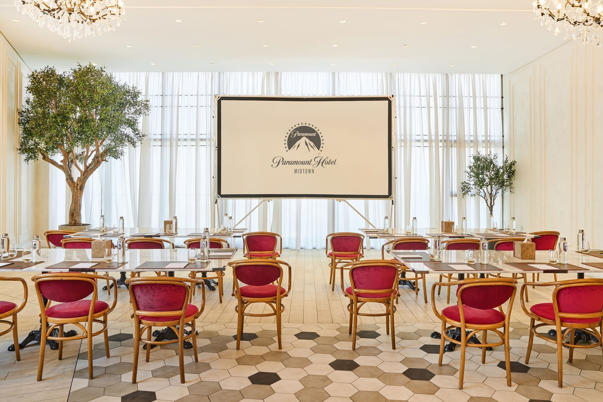 Spacious theater-style meeting room arrangement in Paparazzi restaurant venue at Paramount Hotel