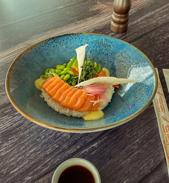 Closeup of salmon poke bowl served at St. George Lycabettus