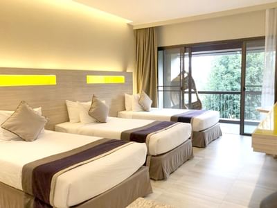 Beds in Triple Mountain View Room at Chatrium Golf Resort