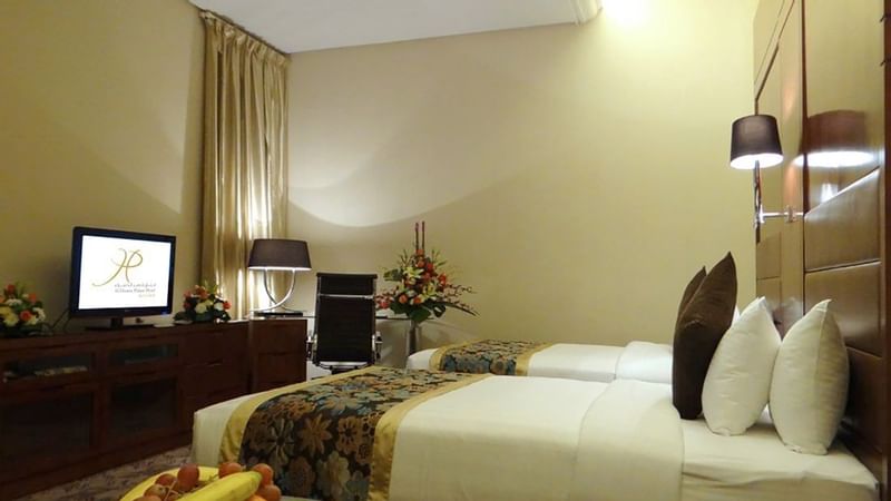 TV facing the bed in Executive Suite at Al Hamra Palace by Warwick Riyadhd