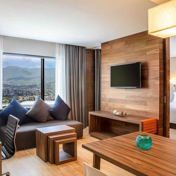 Wooden interior of living area in Junior Suite at Fiesta Inn