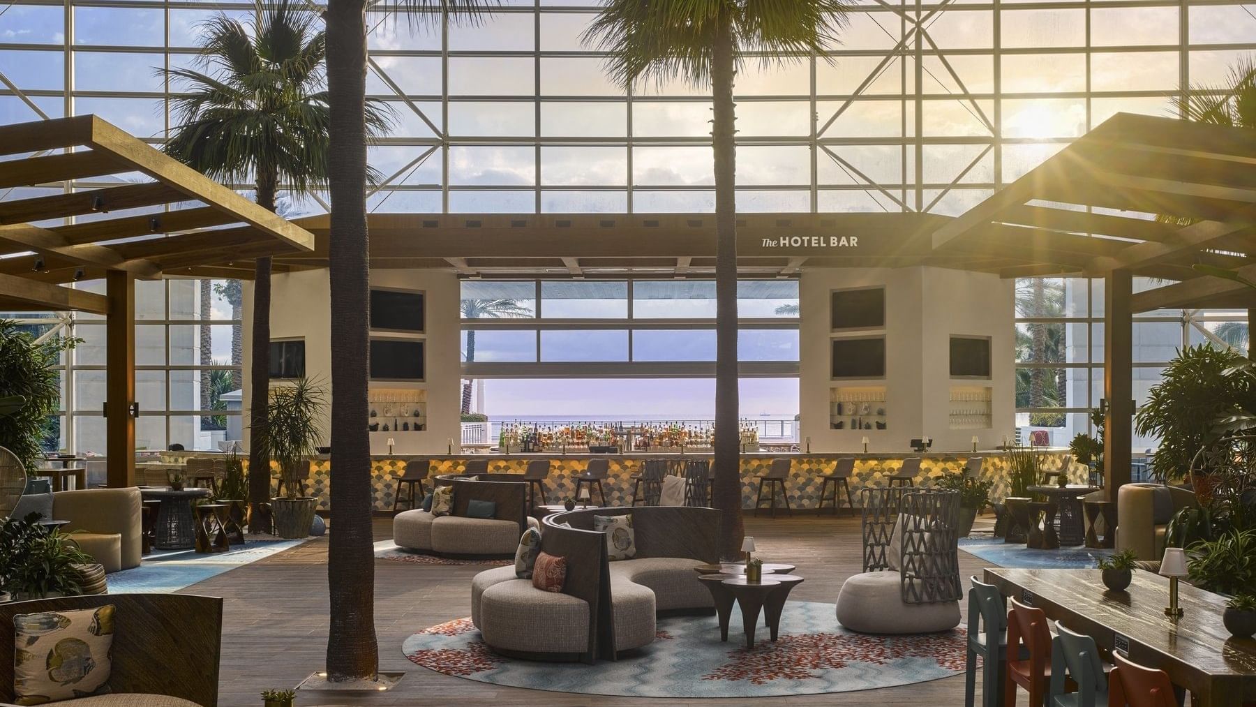 Lounge area with bar counter in The Hotel Bar at The Diplomat Resort