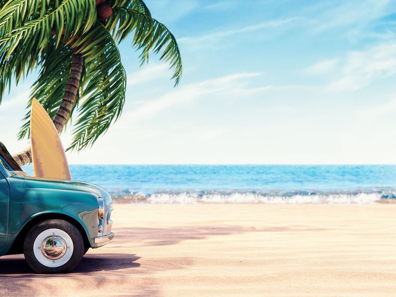 Car on the beach in front of trees at Daydream Island Resort