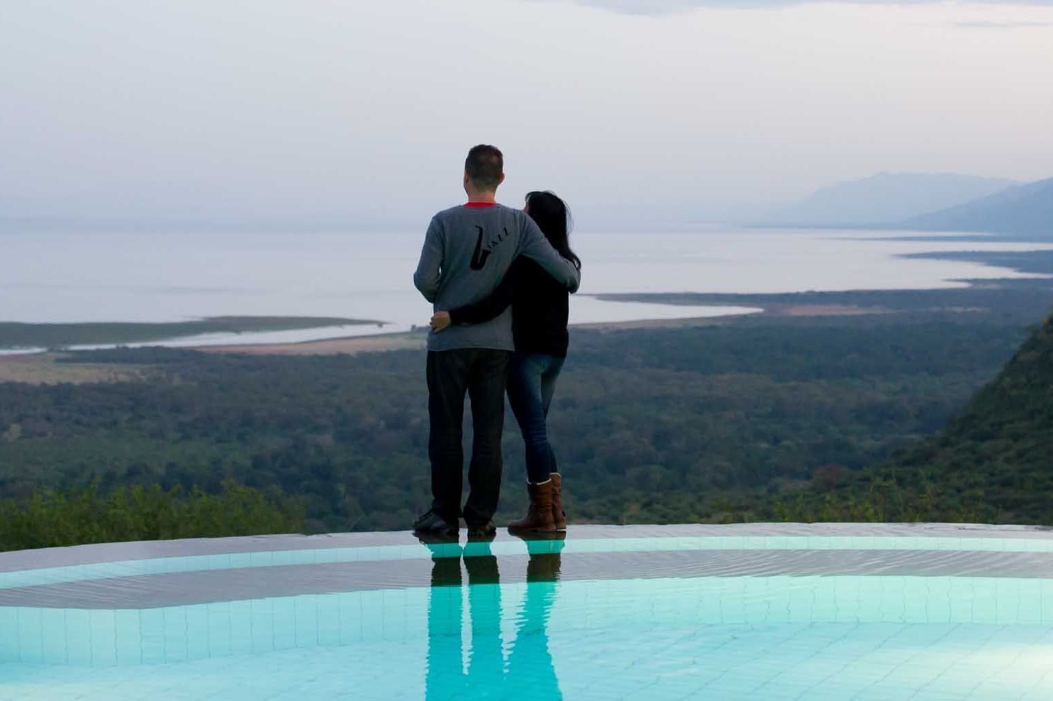 A Couple standing by the pool at the Lake Manyara Serena Lodge