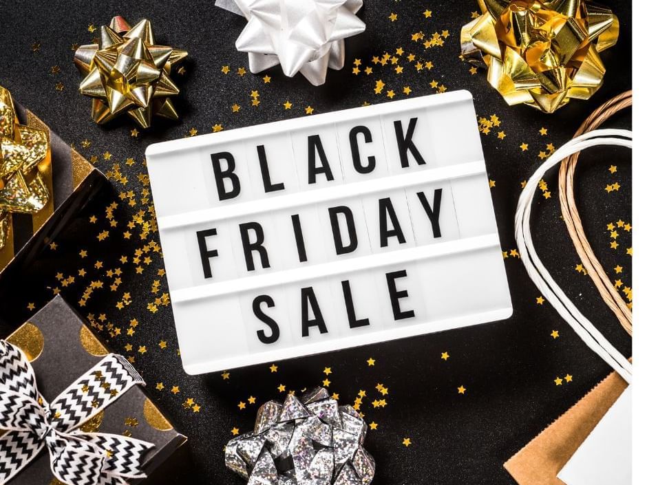 Black Friday Sael sign with Christmas bows 