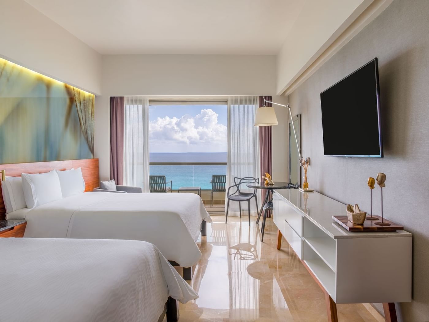 Twin beds & TV in Premium Ocean Front at Live Aqua Resorts