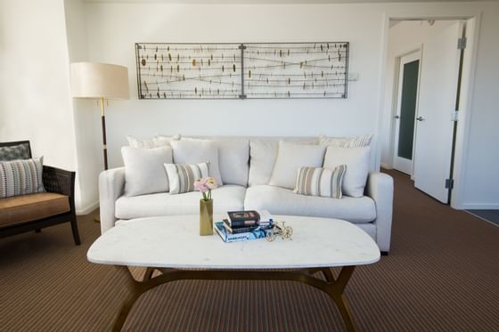 Couch and coffee table in presidential suite living area