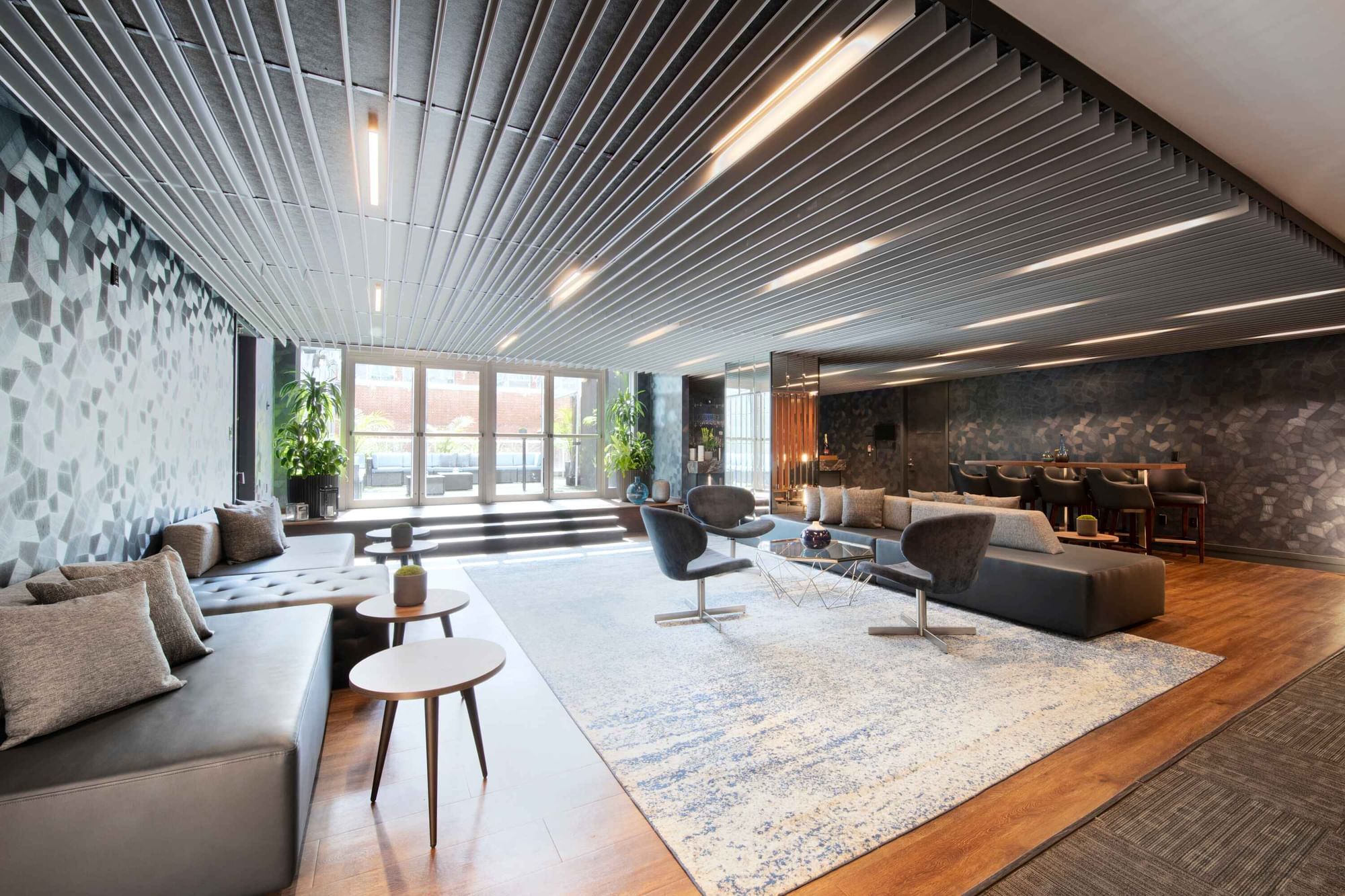 Contemporary lounge at Warwick Hotels and Resorts with modern furniture and sleek decor