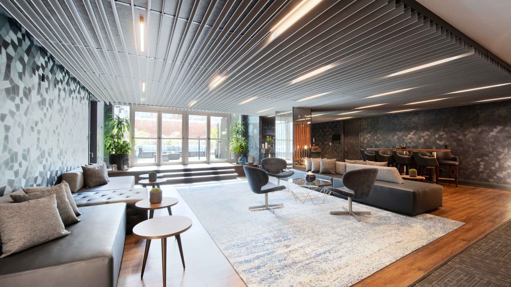 Contemporary lounge at Warwick Hotels and Resorts with modern furniture and sleek decor