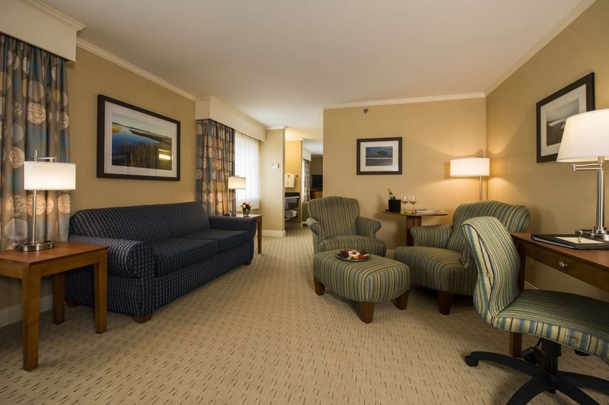 Parlor Suite's living room with work area at Gorges Grant Hotel by Ogunquit Collection