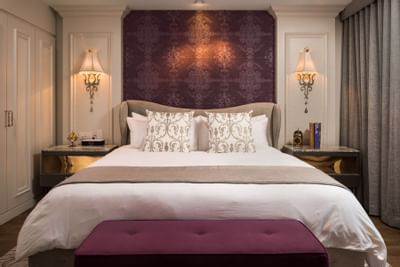 large bed with maroon color