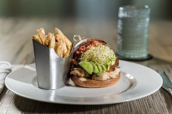 Sandwich and fries served in Ovation at Innovation Hotel