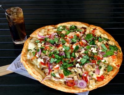 Close up of pizza served at Pizza Press in Anaheim Hotel